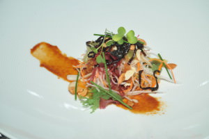 Chef Adrian Mellor’s Oriental salad, pirikara sauce, miso and seaweed served with Cakebread Cellars Chardonnay 2009 at the Cakebread dinner at the Leela Palace, Bangalore
